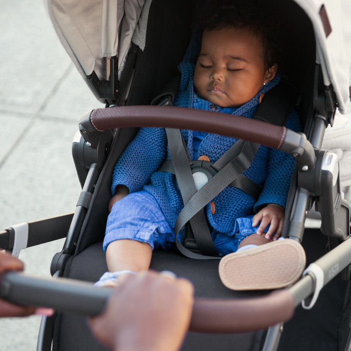 Child napping in stroller