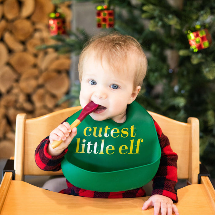 caption-Holiday Themed Elf Feeding Bib for Baby reads Cutest Little Elf