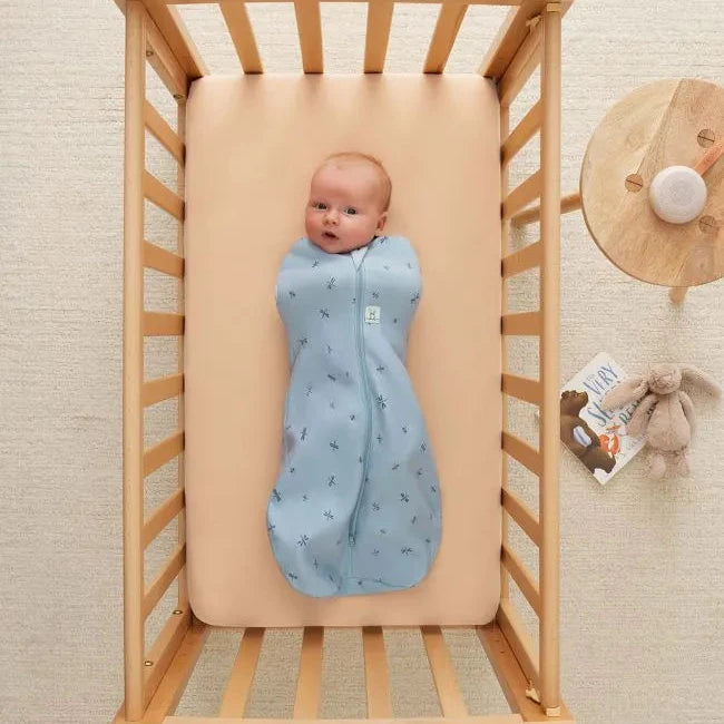 caption-Baby wearing Ergo Cocoon with arms tucked in