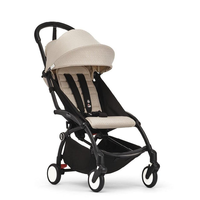 caption-Stokke YOYO3 in Bon Point Beige on Black Frame