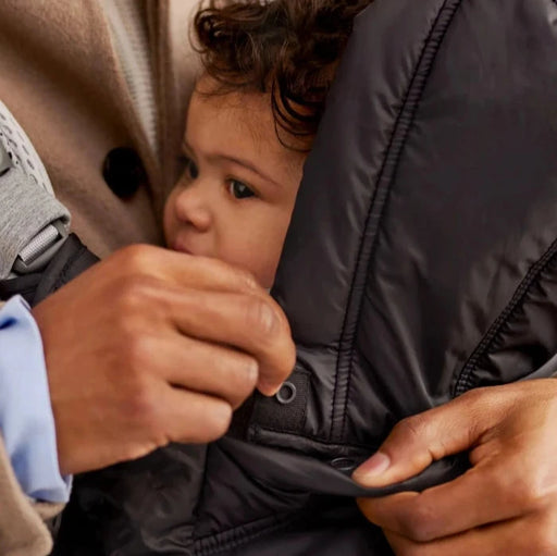 caption-Winter Cover for Baby Bjorn Carriers features a reversible hood