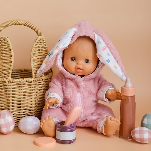 caption-Doll dressed in pink bunny outfit (items sold separately)