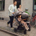 caption-Nuna TRVL dubl Stroller for two family with car seat and child