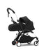 caption-Black Newborn 0+ Stokke YOYO3 shown on white frame